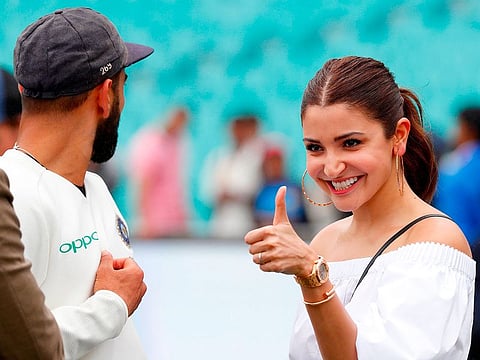 Virat Kohli and his wife Anushka Sharma as he celebrates with teammates after winning the Test series between against Australia at the Sydney Cricket Ground on January 7, 2019.