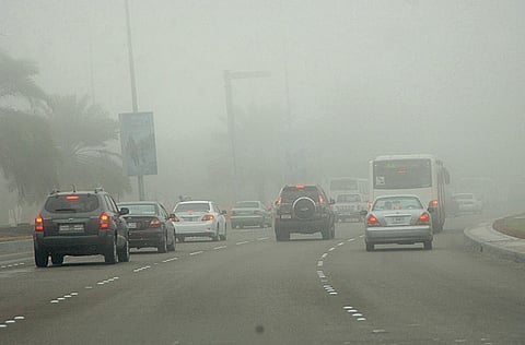 Dubai Police warn motorists as dense fog raises accident risks Drivers urged to slow down, maintain safe distance and follow safety rules as patrols intensify monitoring on major roads