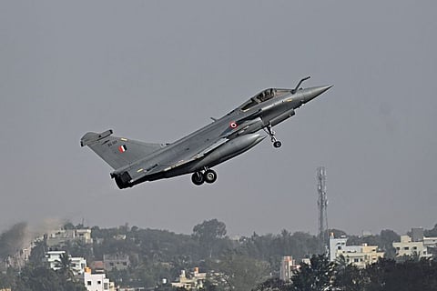Indian Air Force's Rafale fighter jet takes off during the first day of the Aero India 2021 Airshow at the Yelahanka Air Force Station.