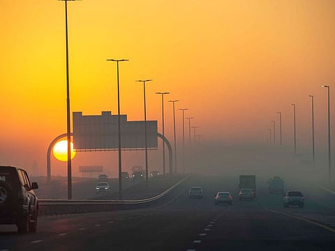 Thick fog veils the sun as it rises in the UAE on Thursday.