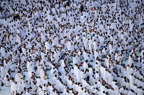 Pilgrims pray around the Kaaba at the Grand Mosque, in Mecca, during the Hajj on June 6.