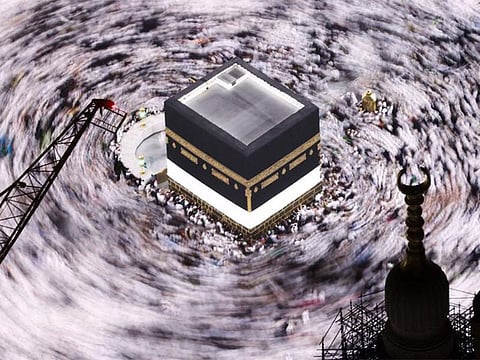 Pilgrims perform the Umrah at the Holy Kaaba, as they start arriving to perform the annual Hajj at the Grand Mosque, in the holy city of Mecca, Saudi Arabia.
