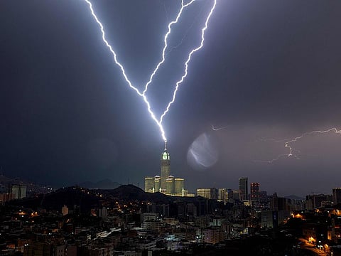 Kingdom braces for unstable weather with heavy rain expected across coastal and inland regions. Lightning over Mecca's clock tower, August 22, 2023.