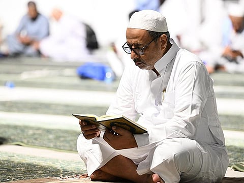 A pilgrim reads the Quran inside the Grand Mosque in Mecca. The initiative reflects the Kingdom’s deep commitment to serving Islam and its sacred texts, and to honouring pilgrims with a meaningful and spiritual farewell gift.