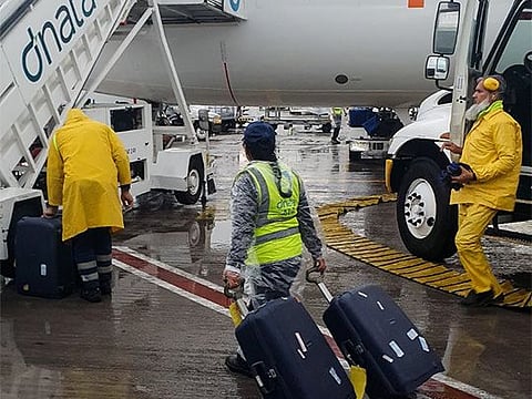 Residents and employees went about their daily duties at Dubai airport.