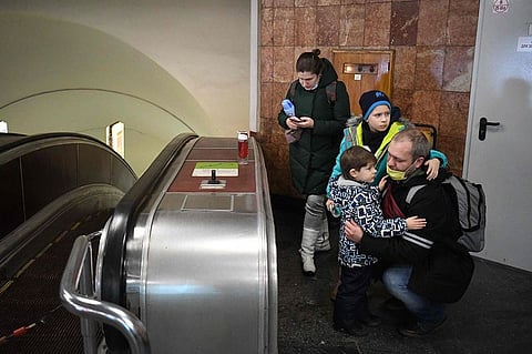 A family takes shelter in a metro station in Kyiv.
