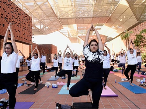 File photo: UAE residents at the yoga event in Expo City, Dubai.