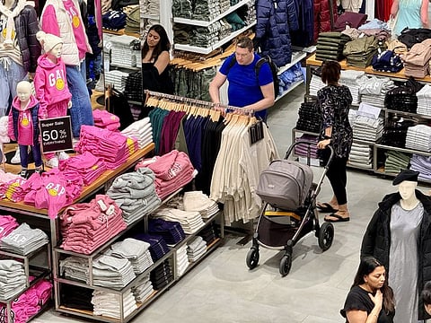 Visitors enjoy shopping at Mall of the Emirates in Dubai.