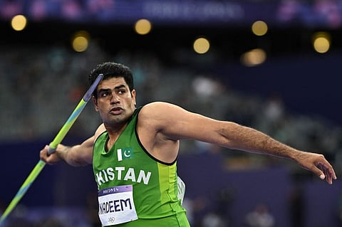 Pakistan's Arshad Nadeem competes in the men's javelin throw final of the athletics event at the Paris 2024 Olympic Games at Stade de France in Saint-Denis, north of Paris, on August 8, 2024.