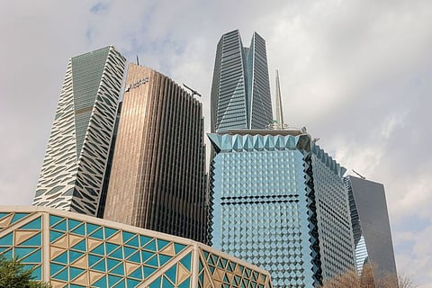 The KAFD World Trade Center, Riyadh Bank skyscraper office building, Public Investment Fund (PIF) tower, and the Saudi National Bank (SNB) headquarters, left to right, beyond the King Abdullah Financial District Conference Center in the King Abdullah Financial District (KAFD) in Riyadh, Saudi Arabia.