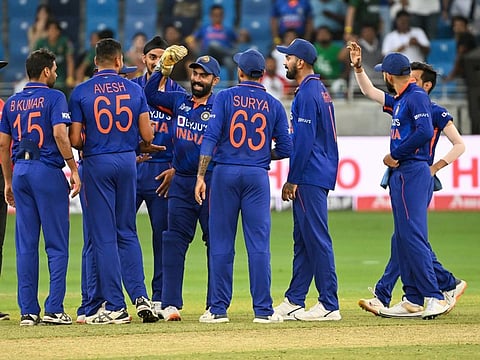 Indian players celebrate the wicket of Pakistan batsman Fakhar Zaman in the DP World Asia Cup match at Dubai International Cricket Stadium on August 28, 2022.