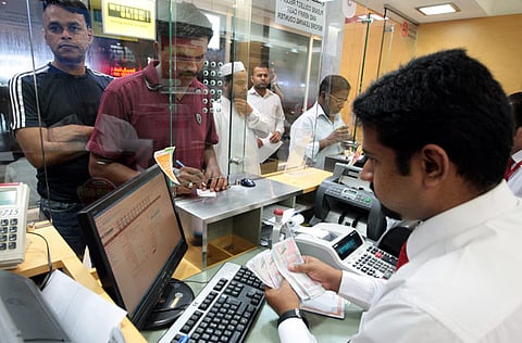 File photo of currency exchange. Asian currency dip boosts remittance returns for UAE workers.