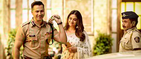 Varun Dhawan, Keerthy Suresh, and Rajpal Yadav in a still from 'Baby John'