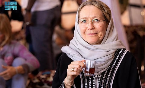 A foreign visitor at the King Abdulaziz Camel Festival.
