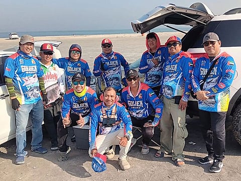 Members of the Golden Anglers, a Filipino fishing club with over 100 members from across the UAE, go for fishing at Al Zorah Beach in Ajman.