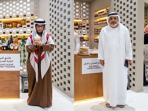 One of the oldest Emirati beekeepers Hamad Ali Bin Rabaa Al Kaabi and the youngest beekeeper Abdallah Hamad Al Kaabi at the Hatta Honey Festival