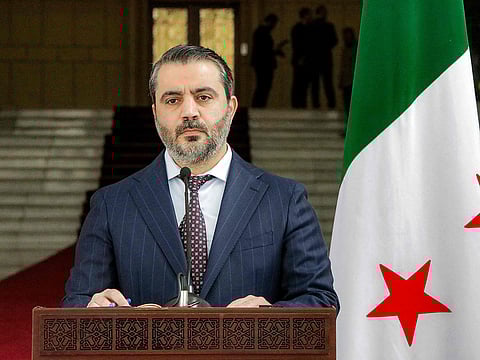 Asaad Shaibani, Foreign Minister for the interim Syrian government, gives a joint press conference with Ukraine's Foreign Minister in Damascus on December 30, 2024.