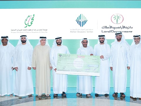 Officials during the donation handover ceremony in Dubai