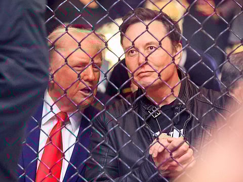 File photo: US President-elect Donald Trump (L) and Tesla and SpaceX CEO Elon.