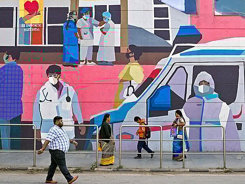 A wall mural promoting awareness on using face masks in Bengaluru on January 6, 2025, amid concerns after two cases of Human Metapneumovirus (HMPV) were reported in India's Karnataka state.