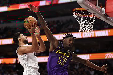 Quentin Grimes of the Dallas Mavericks makes a move to the basket against Dorian Finney-Smith of the Los Angeles Lakers during the third quarter at American Airlines Center on Monday.