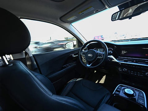 A Kia Vay remote-drive electric vehicle cruises during a live demonstration of remote driving on city streets ahead of the Consumer Electronics Show (CES) in Las Vegas, Nevada, on January 6, 2025.