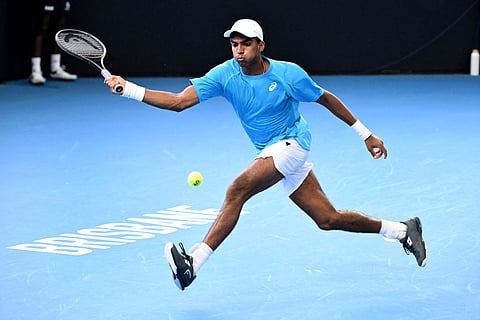 Nishesh Basavareddy of the US hits a return during his loss to Gael Monfils in Brisbane last week. The Indian-American teenager will meet Novak Djokovic in the Australian Open first round.