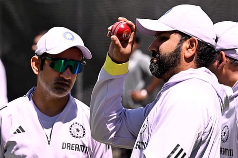 Indian coach Gautam Gambhir (left) and captain Rohit Sharma chat in the nets at the Melbourne Cricket Ground on December 24.