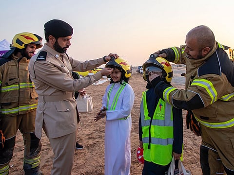Sharjah Police and Sharjah Civil Defence officials during the field visit in Al Rahmaniyah