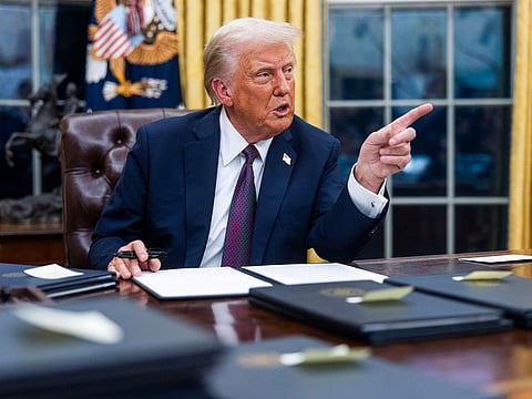 US President Donald Trump speaks while signing executive orders in the Oval Office of the White House in Washington, DC, US, on Monday, Jan. 20, 2025.