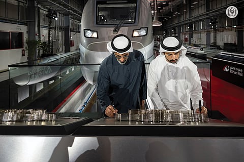 Sheikh Khaled bin Mohamed bin Zayed Al Nahyan and Sheikh Hamdan bin Mohammed bin Rashid Al Maktoum have witnessed the announcement of a new high-speed train project linking Abu Dhabi and Dubai.