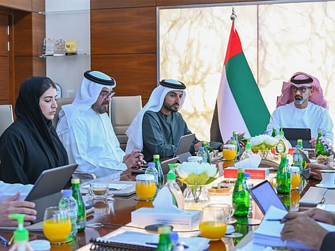 His Highness Sheikh Ammar bin Humaid Al Nuaimi, Crown Prince of Ajman, Chairman of Ajman Bank, with the Board of Directors and the CEO of Ajman Bank