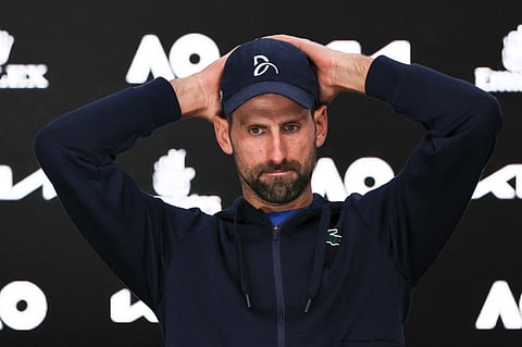 Novak Djokovic addresses a press conference after retiring from the Australian Open semi-finals against Alexander Zverev in Melbourne on Friday.