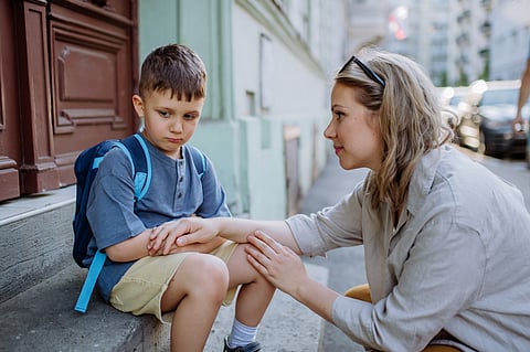 It’s important not to press the child for information, especially if they seem to avoid the topic—this could make them feel ambushed. Regular check-ins and cultivating an environment of open communication can help normalise discussions about difficult topics.