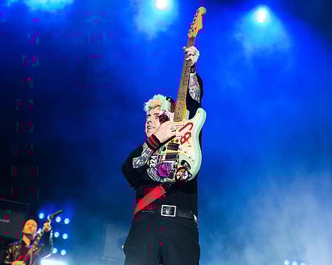 Billie Joe Armstrong performs with his band Green Day, at Dubai Expo.
