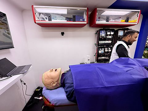 The system will pull up information about the patient. Seen here is a model of an ambulance patient at DCAS stand at Arab Health 2025 in Dubai.