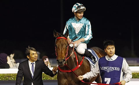 Romantic Warrior, darling of Hong Kong racing, didn't disappoint as he won the 1,800-metre G1 Jebel Hatta (presented by Longines), one of the feature races of Meydan’s Fashion Friday meeting.