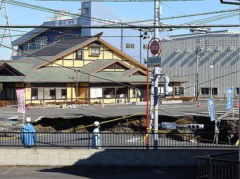 This photo shows a general view of a collapsed road at a prefectural road intersection, in the city of Yashio, Saitama Prefecture on January 30, 2025.