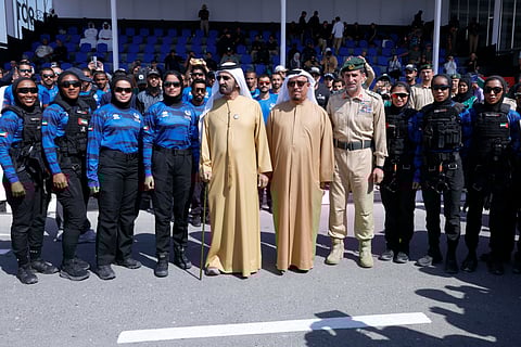 Sheikh Mohammed bin Rashid Al Maktoum with Dubai Police Women Swat team during his visit to the UAE Swat Challenge 2025 competitions in Dubai on Tuesday.