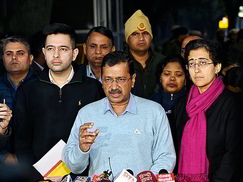 Aam Aadmi Party (AAP) National Convener Arvind Kejriwal speaks to the media after meeting with the Election Commission, at Nirvachan Sadan in New Delhi on Tuesday. Delhi Chief Minister Atishi and party MP Raghav Chadha are also seen.