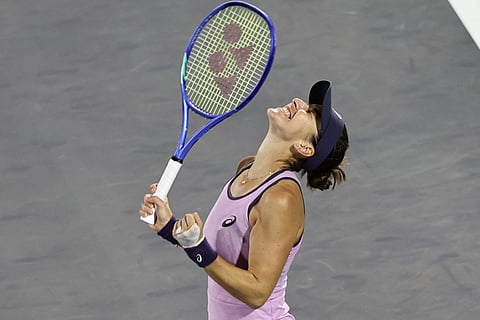 Switzerland's Belinda Bencic celebrates after defeating Kazakhstan's Elena Rybakina during their women’s semi-final singles match at the Abu Dhabi Open tennis tournament in Abu Dhabi on Friday.