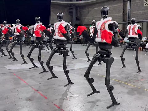 16 humanoid robots performed a synchronised dance routine, astonishing and unsettling audiences alike.