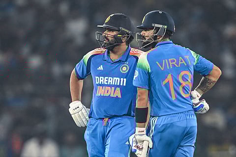 India's Virat Kohli (R) along with his captain Rohit Sharma.