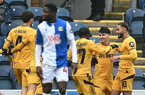 Wolverhampton Wanderers' Brazilian striker Matheus Cunha celebrates scoring the team's second goal during the English FA Cup fourth round football match against Blackburn Roversat Ewood Park in Blackburn, north-west England on February 9.