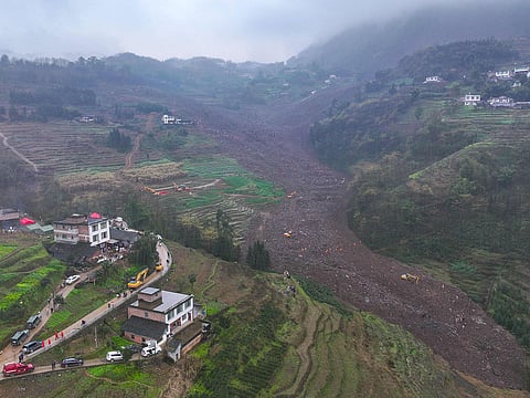 Rescuers work at the site of a landslide in Jinping village in the city of Yibin, in China’s southwest Sichuan province on February 9, 2025.