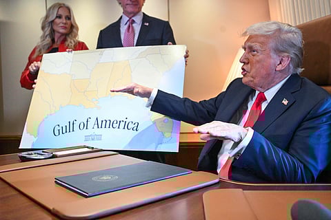 US President Donald Trump speaks to the press before signing a proclamation renaming the Gulf of Mexico as the Gulf of America aboard Air Force One, as it flies over the Gulf enroute to New Orleans, Louisiana on Febrary 09, 2025.