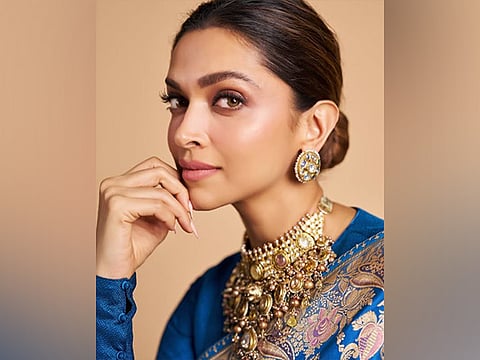 Bollywood actress Deepika Padukone wearing gold jewellery. This image is for illustrative purposes alone.