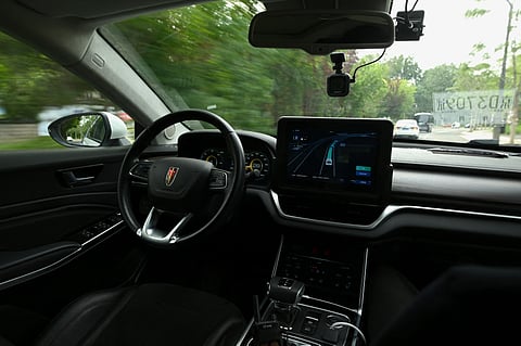View from inside an Apollo Robotaxi, a paid driverless taxi service by Chinese tech giant Baidu, which drives at the Shougang Park, on July 2, 2021 in Beijing.