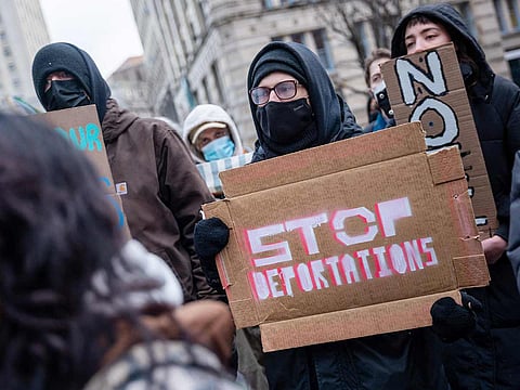 Protesters hold a rally and march against the policies of the Donald Trump administration and its immigration policies in lower Manhattan on February 13, 2025 in New York City.
