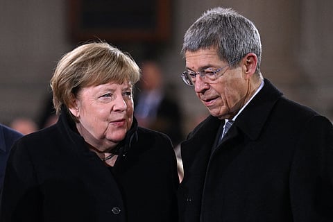 German former Chancellor Angela Merkel and her husband Joachim Sauer attend the state commemoration ceremony in memory of late former German President Horst Koehler, on February 18, 2025 at Berlin Cathedral in Berlin.